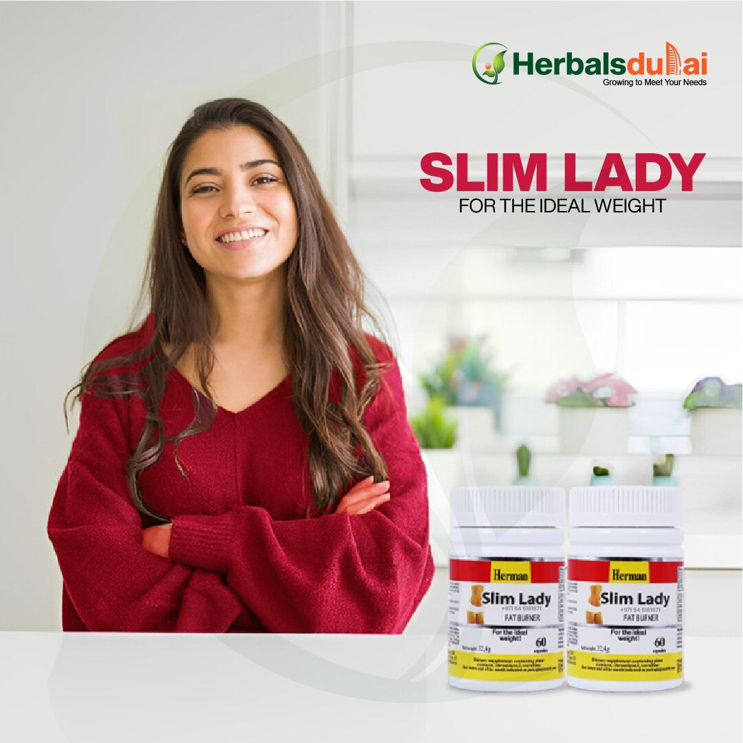 Woman in a red sweater smiling with her arms crossed, standing next to bottles of "Slim Lady" fat burner, with Herbals Dubai branding.