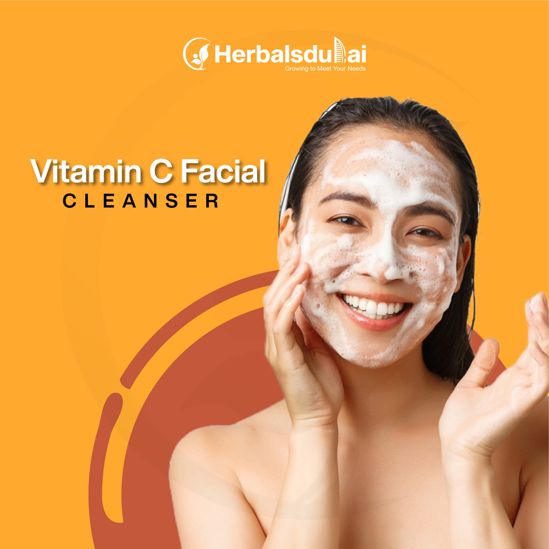 A smiling woman with facial cleanser foam on her face in front of an orange background featuring the text "Vitamin C Facial Cleanser" and "Herbals Dubai" logo.