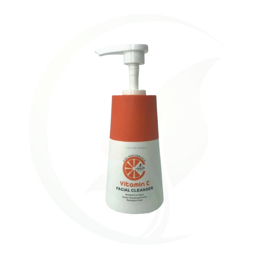 Bottle of Vitamin C facial cleanser with a pump dispenser, featuring an orange and white color scheme, and product details on the label.