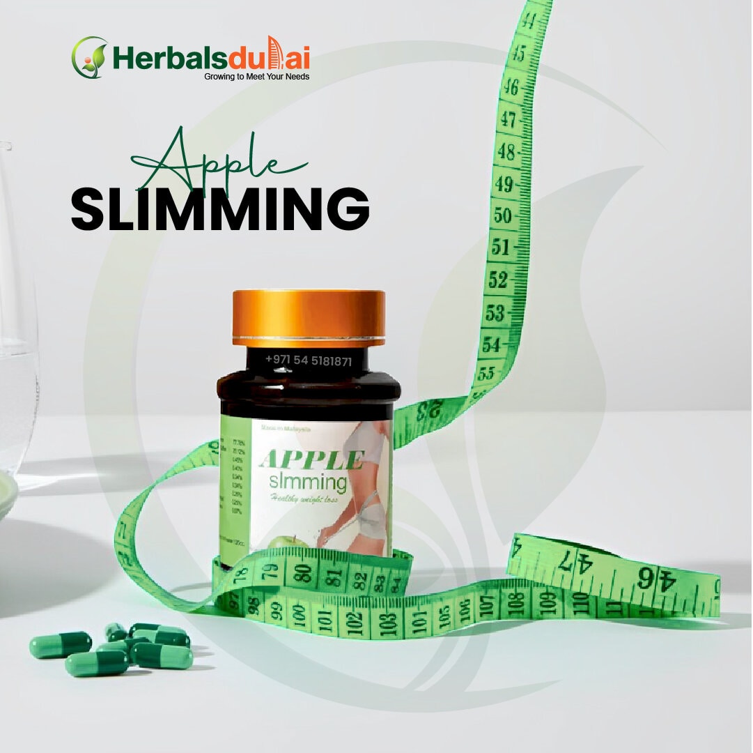 A bottle of apple slimming supplements surrounded by a green measuring tape and green capsules, promoting weight loss, with the Herbals Dubai logo in the background.